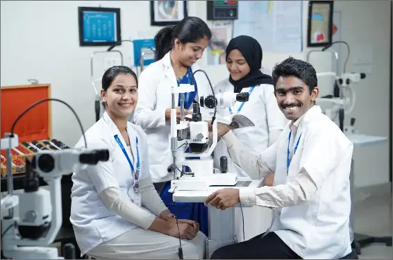 Optometry students working in a lab setting